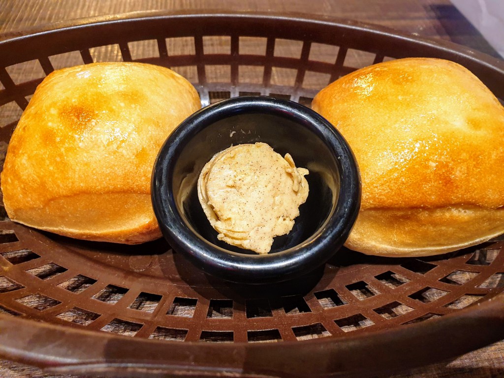 Complimentary dinner bread rolls by Texas Roadhouse